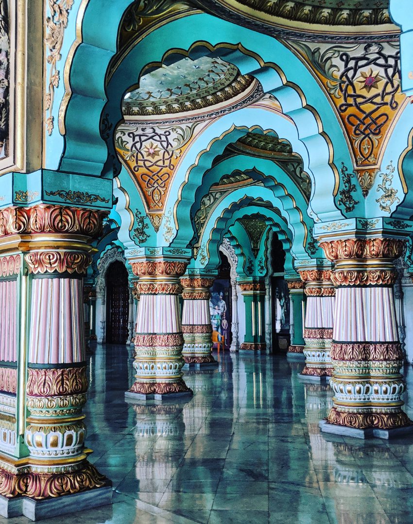 Painted arches and columns in a palace hall